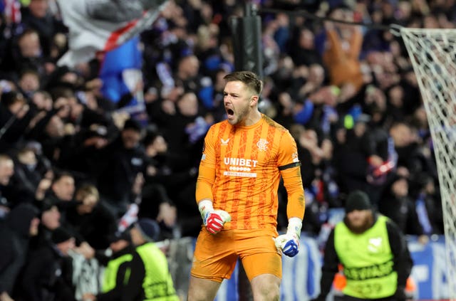 Rangers goalkeeper Jack Butland celebrates after saving a penalty during the shoot-out against Fenerbahce at Ibrox 