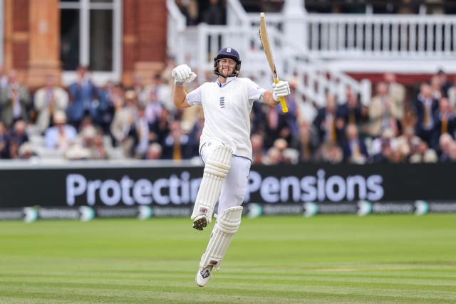 Joe Root jumps into the air to celebrate his century