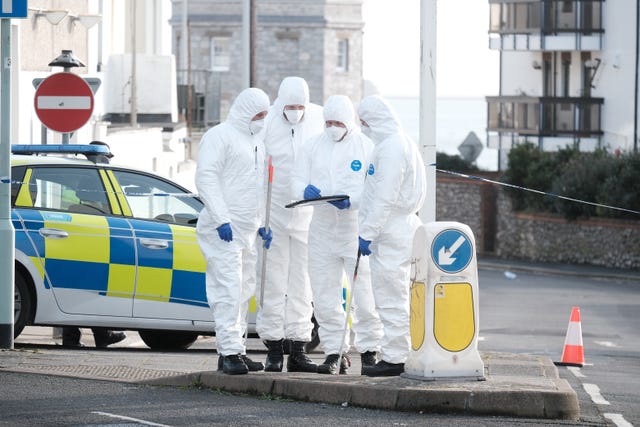 Forensic officers in a street