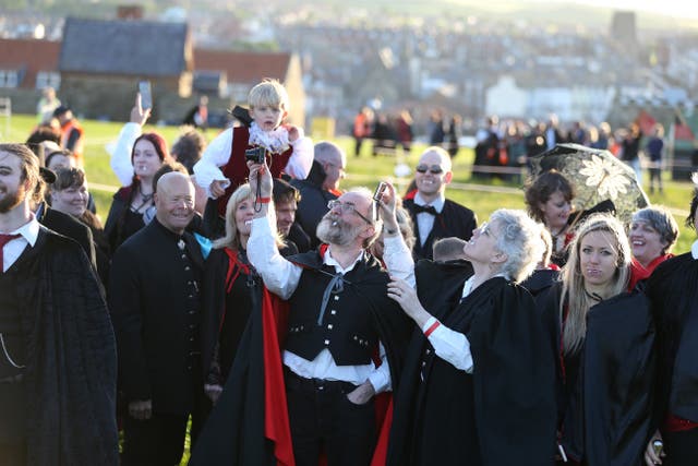 People dressed as Vampires at Whitby Abbey in Yorkshire, as they attempt to set a new Guinness World Record for the most amount of vampires in one place on the on 125th anniversary of the publication of Dracula. Picture date: Thursday May 26, 2022