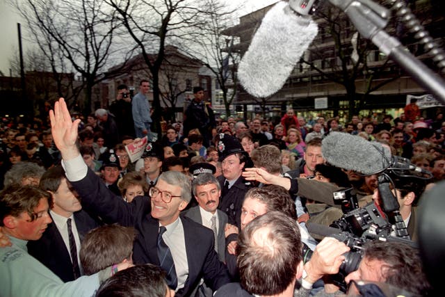 John Major meets people on a walkabout in Bolton during the 1992 general election campaign
