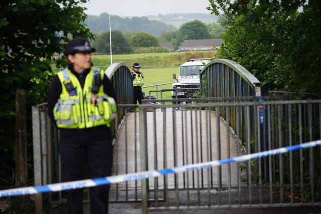 Police at the scene in Sarn, Bridgend (Ben Birchall/PA)