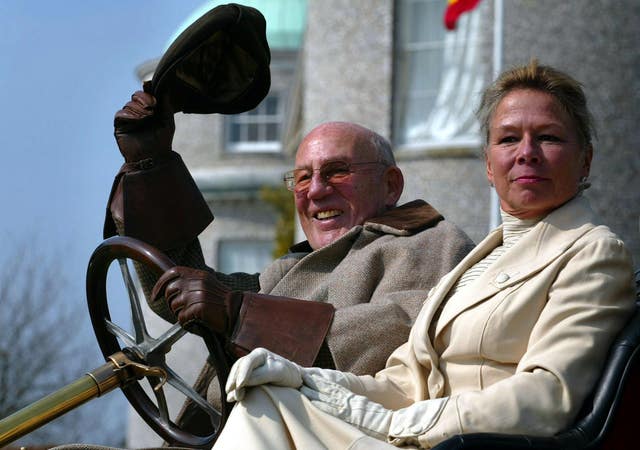 Moss and his wife, Lady Susie Moss, pictured at Goodwood House in 2006 