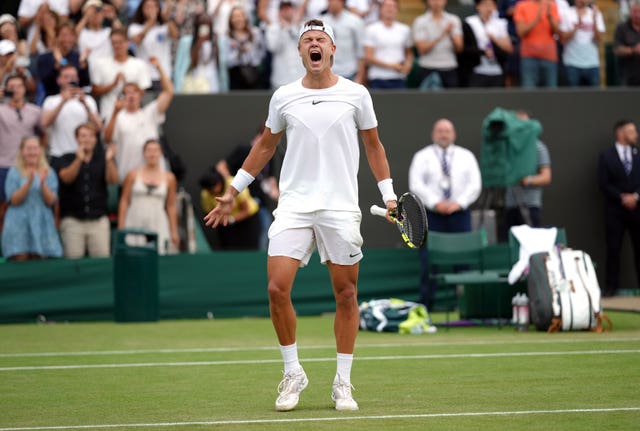 Holger Rune celebrates victory over Alejandro Davidovich Fokina