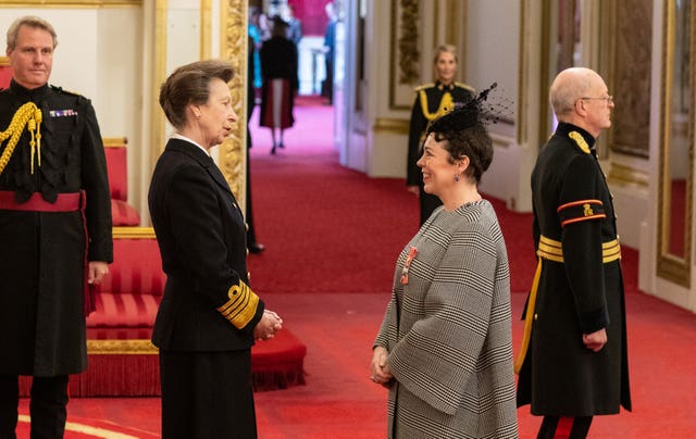 Colman receives a CBE from the Princess Royal (Dominic Lipinski/PA)