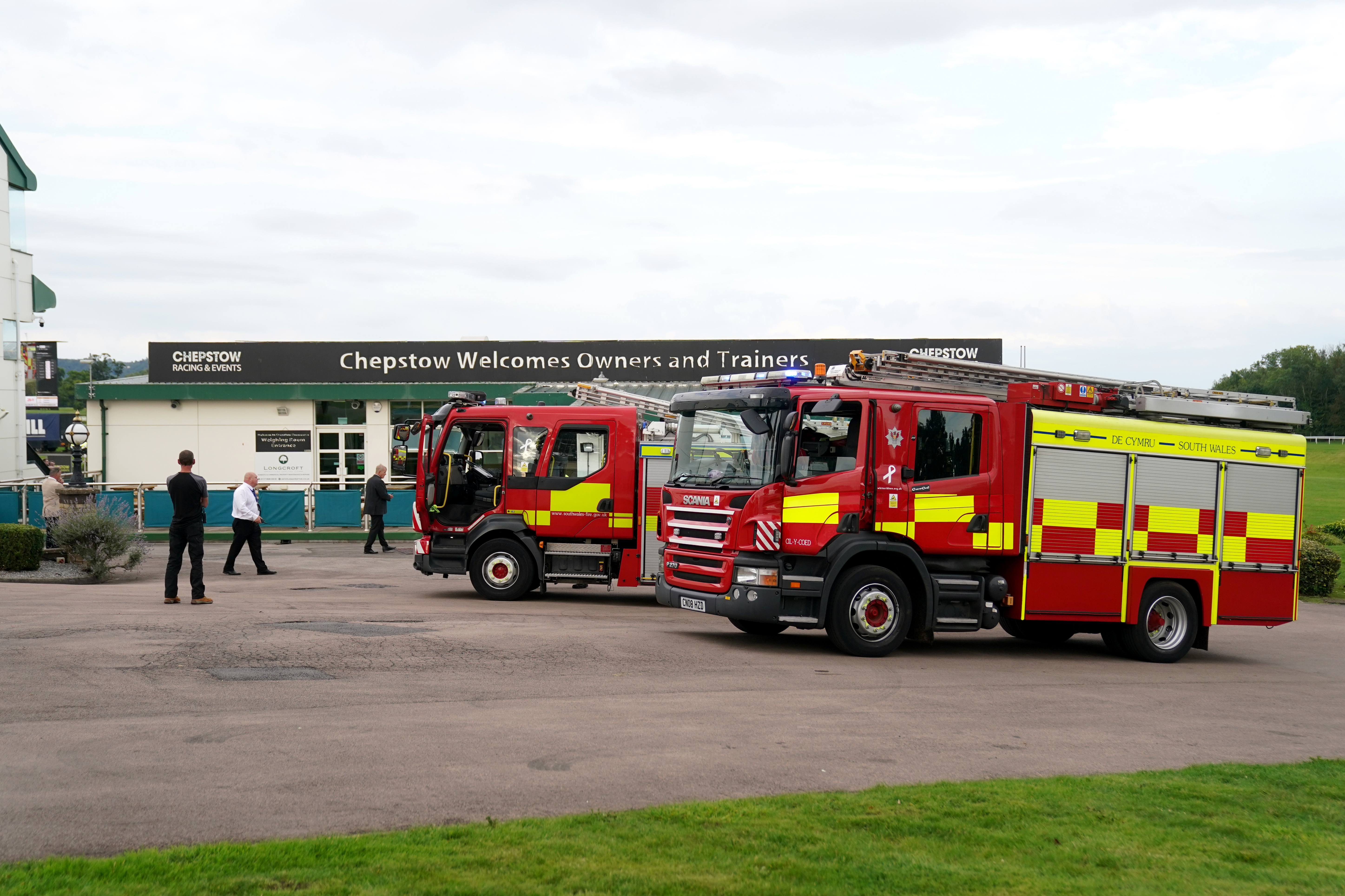 Fire engines arriving at the course due to a fire