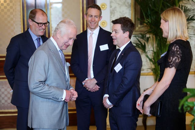 The King with Declan Donnelly and Ali Astall during a reception for Prince’s Trust Award 2024 winners, supporters and ambassadors at Buckingham Palace in London