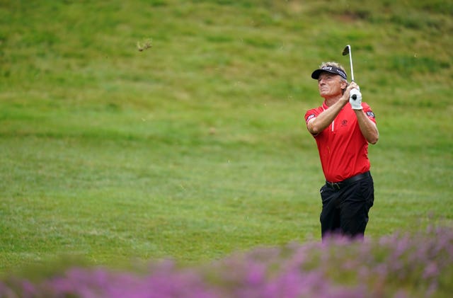 Bernhard Langer watches an approach shot at Sunningdale