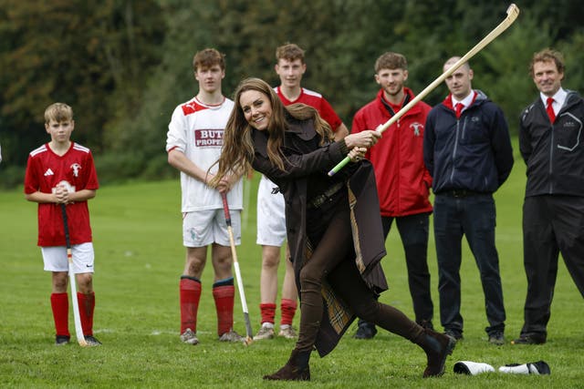 Kate playing shinty