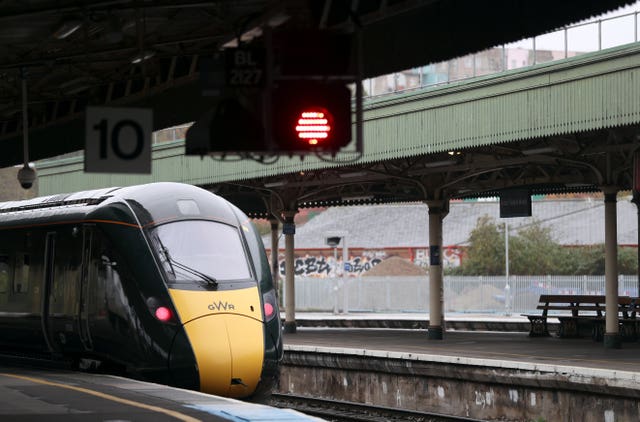 A GWR (Great Western Railway) train waits on a platform at Bristol Temple Meads station