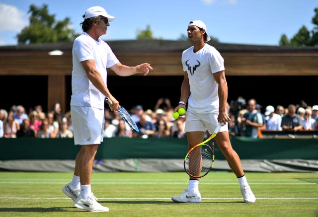 Francisco Roig, left, coaches Rafael Nadal