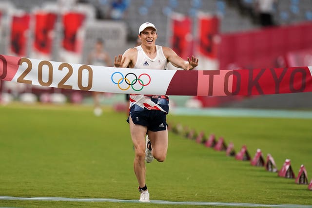 Choong crossing the finish line at the Tokyo Games