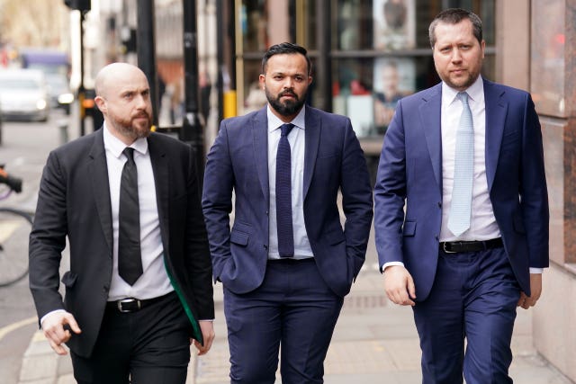 Azeem Rafiq (centre) arriving for the CDC hearing in London on Wednesday morning 
