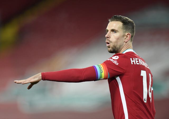 Liverpool’s Jordan Henderson wears a rainbow coloured captain’s armband 