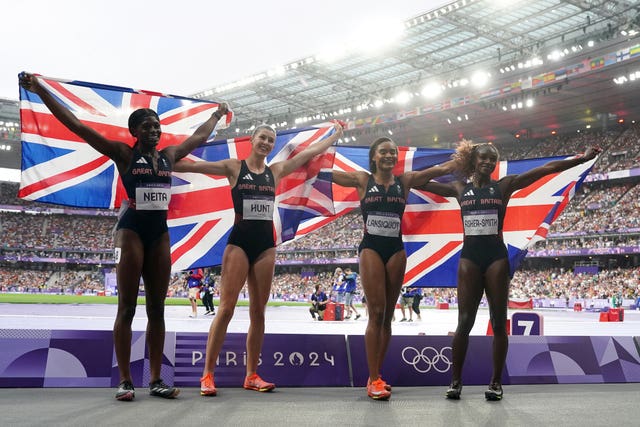 (Left to right) Great Britain’s Daryll Neita, Amy Hunt, Imani Lansiquot and Dina Asher-Smith celebrate winning silver