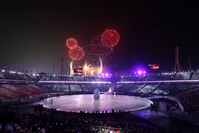Fireworks burst over the Olympic Stadium (AP)