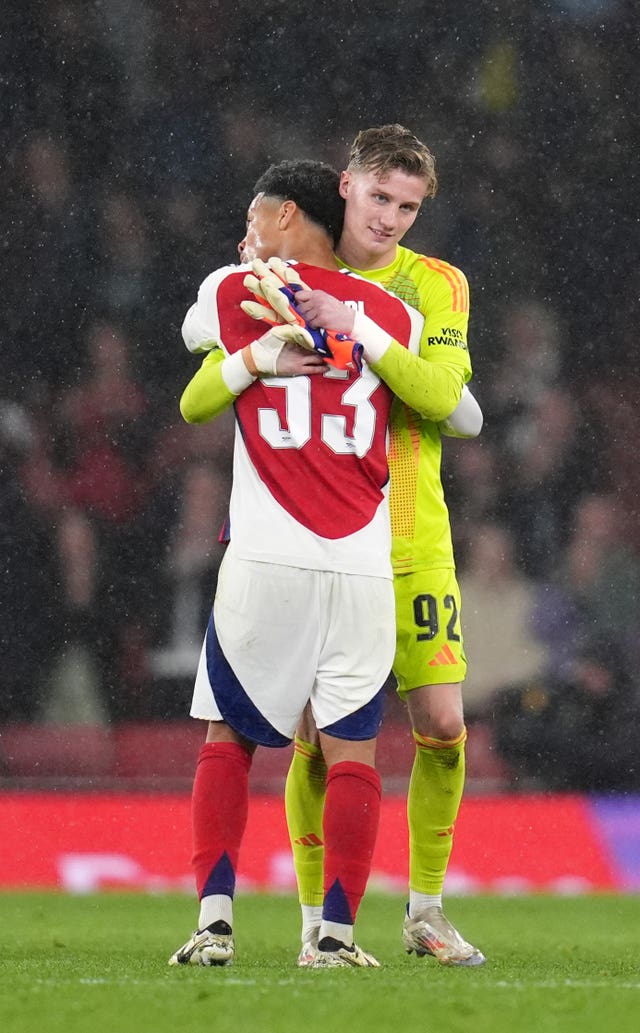 Jack Porter and Ethan Nwaneri embrace at the final whistle 