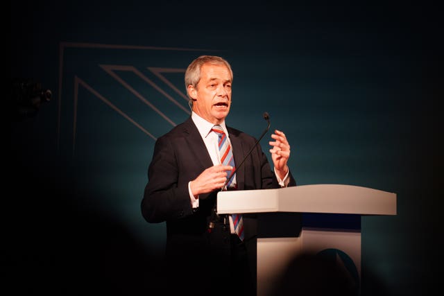 Nigel Farage speaking at a lectern