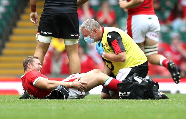 Leigh Halfpenny receives treatment for an injury