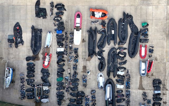 A large number of boats and dinghies on dry land