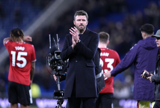 Manchester United manager Michael Carrick applauds