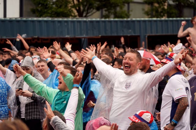 England supporters at a fan park in Newcastle mimic Jude Bellingham's goal celebration