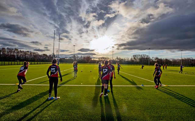 Children play rugby on a new 3G pitch in Warrington