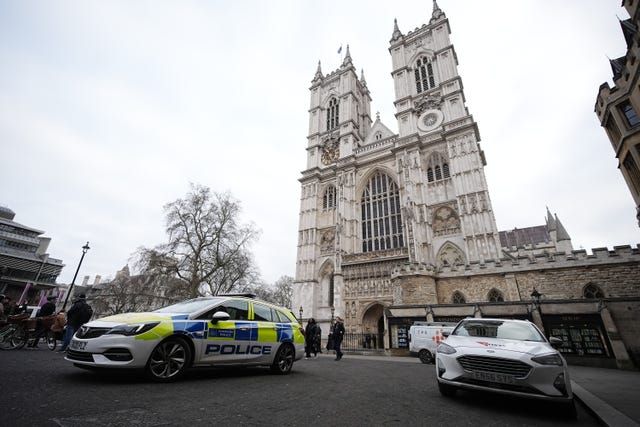 A police car parked outside Westminster Abbey