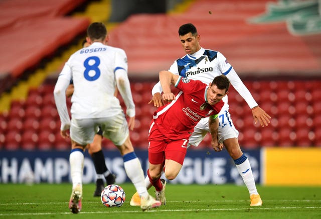 Cristian Romero in action against Liverpool