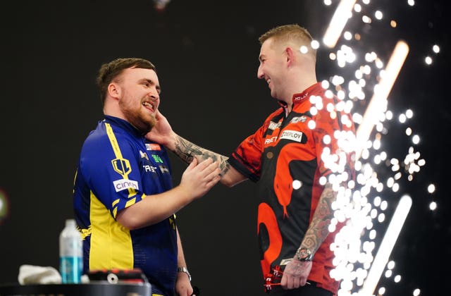 Luke Littler (left) celebrates victory against Nathan Aspinall in the final during night five of the 2025 Premier League in Brighton