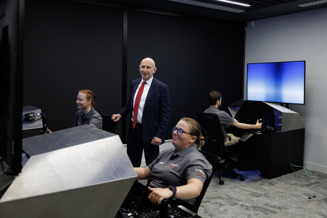 Defence Secretary John Healey is shown an air-to-air combat simulation at the MBDA Storm Shadow factory