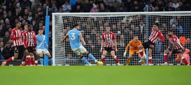 Ruben Dias scores for Man City