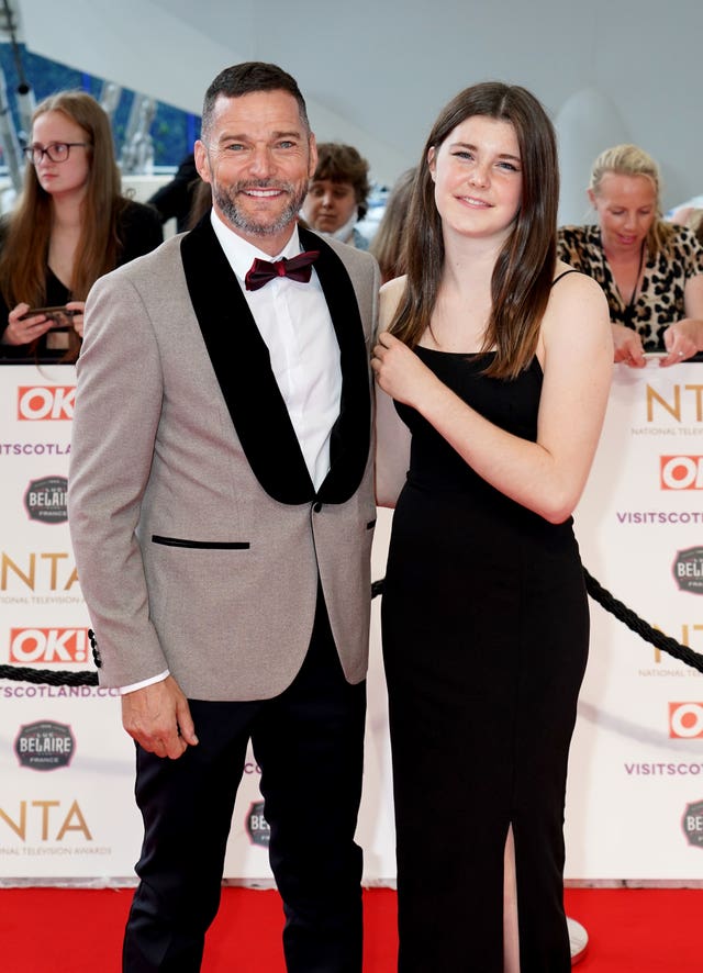 Andrea Spendolini-Sirieix alongside her father Fred Sirieix, at an awards ceremony on the red carpet. 