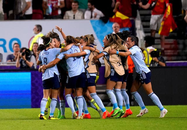 Spain’s Marta Cardona celebrates with her team-mates after scoring the winner