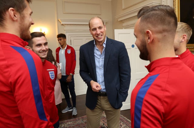 William, the FA's president, is pictured with players as he hosts a reception for the Under-20 England team. Chris Jackson/PA Wire