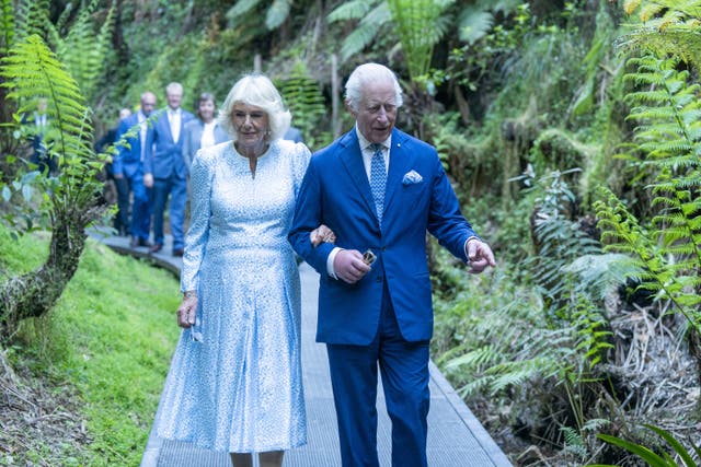 The King and Queen walk through the Rainforest Gully during a visit to the Australian National Botanic Gardens