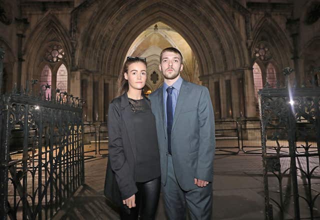 Tom Evans and Kate James at eave the High Court in London (Philip Toscano/PA)