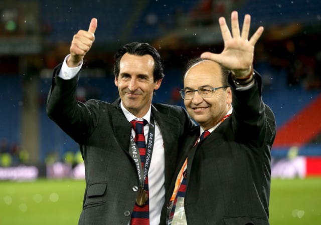 Unai Emery, left, celebrates the 2016 Europa League title with Sevilla president Jose Castro Carmona