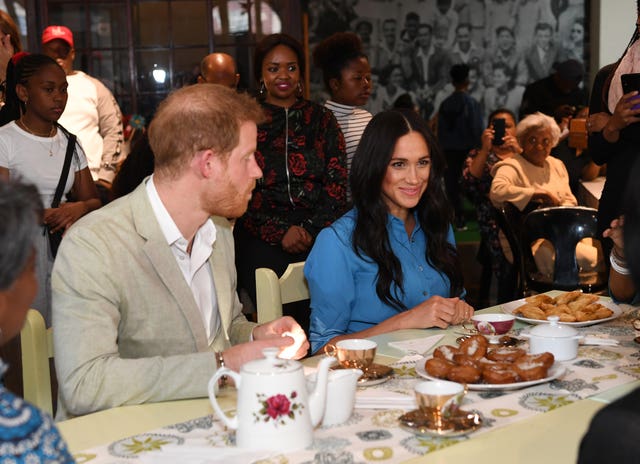 Harry and Meghan at the District Six Homecoming Centre
