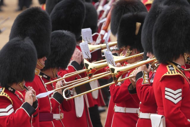 Army musicians play during the Colonel's Review at Horse Guards Parade