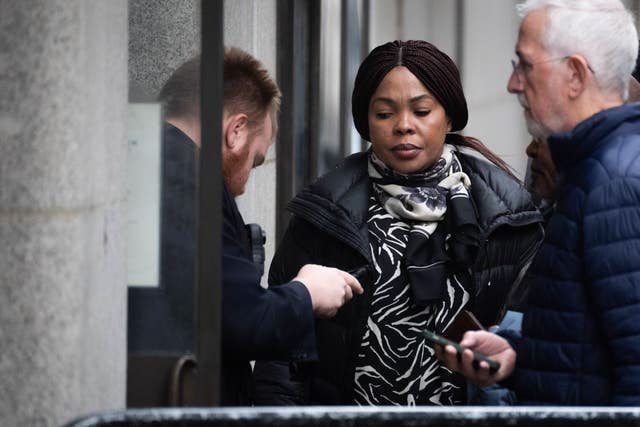 Helen Lumuanganu, the mother of Chris Kaba, arriving at the Old Bailey, e