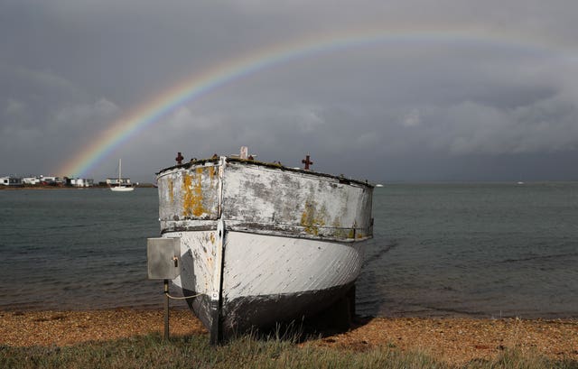 Rainbow over fishing boat in Hampshire