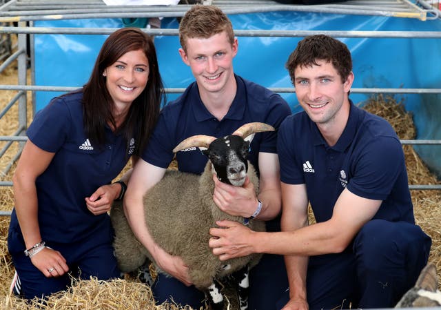 Eve Muirhead with her brothers Thomas, centre, and Glen, right