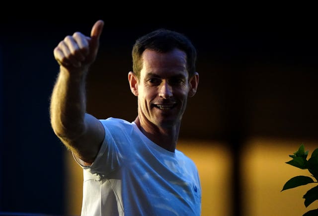 Andy Murray gives a thumbs up to fans