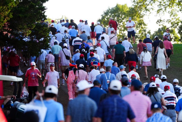 United States fans head for the exit after Europe retained the Ryder Cup