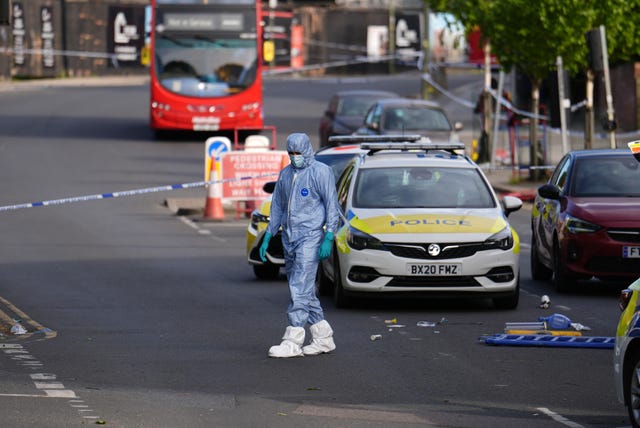 A forensics officer at the scene in Golders Green 