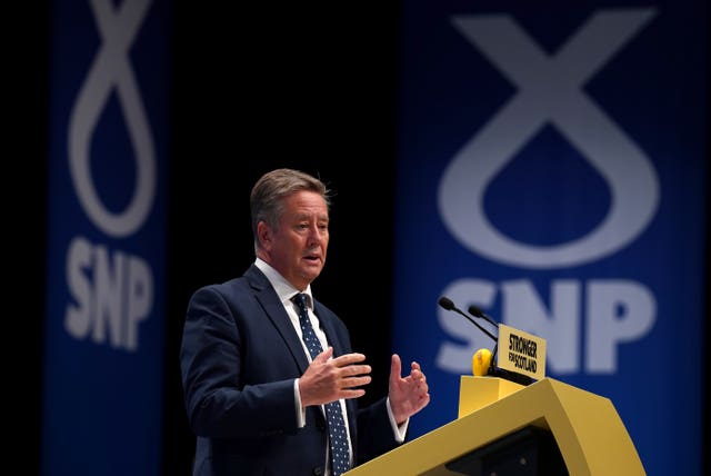 Keith Brown speaking before the SNP conference
