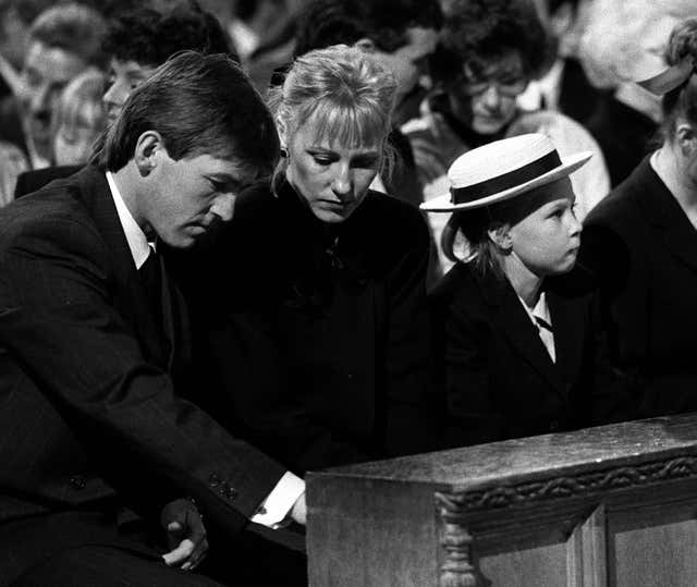 Kenny Dalglish (left) in a memorial for the Hillsborough disaster victims, 1989