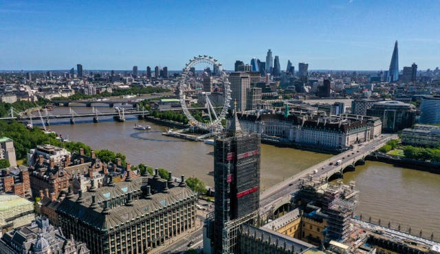 An aerial view of London showing the London Eye (centre) County Hall, Westminster Bridge leading to the Park Plaza Westminster Bridge hotel, Hungerford Bridge and the Royal Festival Hall, Waterloo Bridge, and the Queen Elizabeth Tower, which is covered in scaffolding during refurbishment, and part of the Palace of Westminster