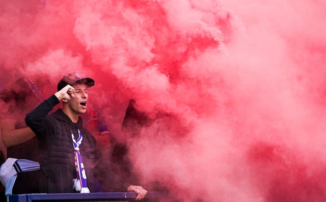 Rangers fans celebrate with flares during their Scottish Cup final victory against Hearts 